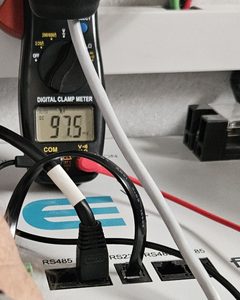 Voltmeter measuring a few millivolts across the terminals of a Freedom Won eTower battery in a low voltage protection state, i.e. shutdown.